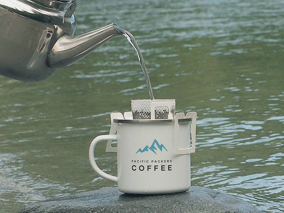 Pouring hot water over the coffee filter. Best coffee for hiking and camping in Canada.